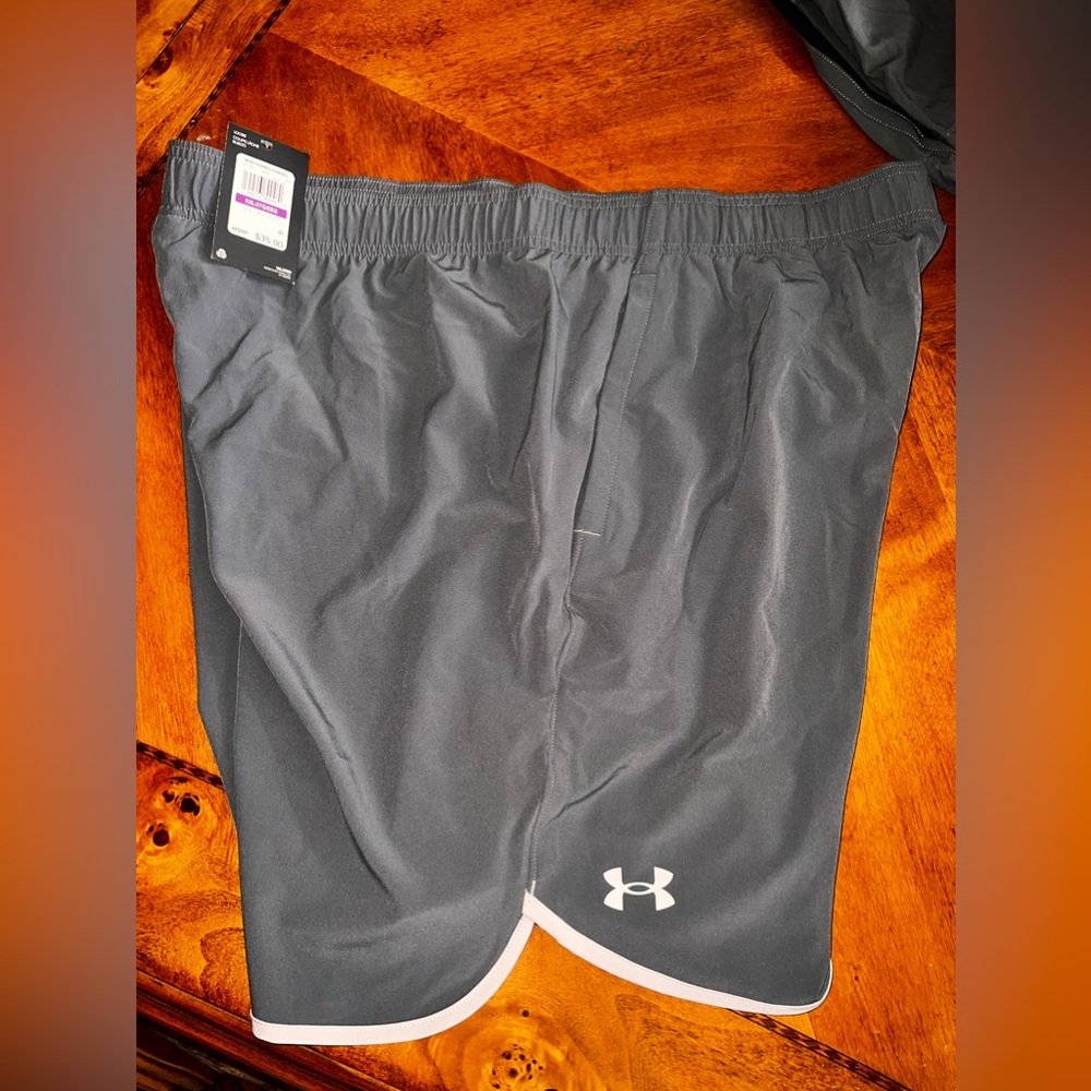 Men’s Under Armour wind-breaker material shorts.